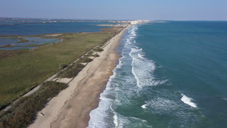 Mediterranean-coast-sandy-beach-Palavas-les-flots-in-background-aerial-shot